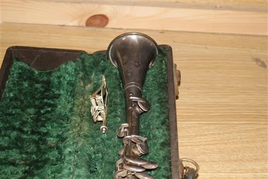 A Gladiator silver plated clarinet, cased